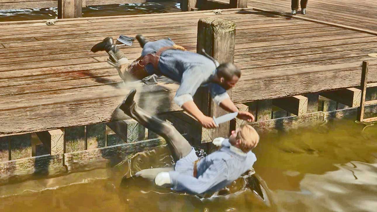 Charles Smith falls into the water along with the enemy