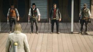 Micah stands in front of the gang he betrayed
